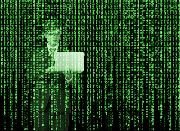 Digital hologram in a matrix style. A person with laptop is browsing data in the Internet. Green. — Stockfoto