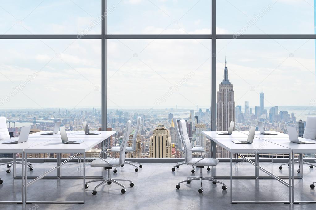 Workplaces in a modern panoramic office, New York city view from the windows. A concept of financial consulting services. 3D rendering.