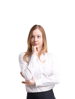 Beautiful lady in formal clothes pondering on future business or career perspectives. White shirt and black skirt. Isolated on white background.