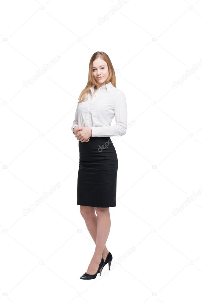 Full length beautiful lady in formal clothes. White shirt and black skirt. Isolated on white background.