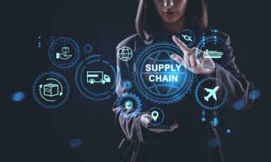 Businesswoman interacts with glowing supply chain hologram, digital logistics icons in futuristic style on dark background, concept of global logistics