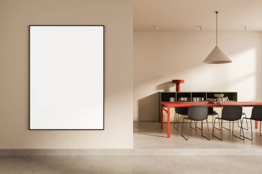 Large vertical blank poster on beige wall in modern interior with red dining table, chairs, bookshelf and pendant light. 3D Rendering