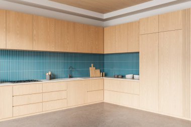 Modern mutfak içi hafif ahşap dolap, dikey mavi fayans kaplama ve çağdaş bir alanda minimalist dekor. 3B Hazırlama