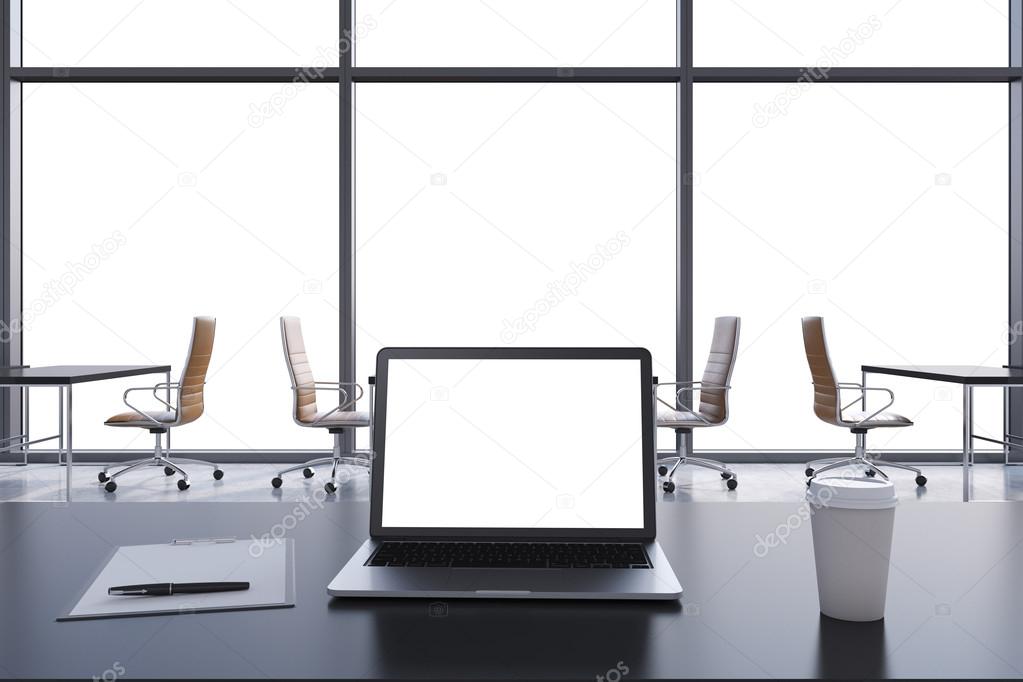 Front view of the workplace in a modern panoramic office with copy space in the windows. Black tables and brown chairs. A laptop with a white display, notepad and a coffee cup. 3D rendering.