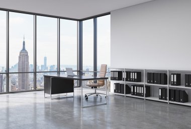 A CEO workplace in a modern corner panoramic office in New York city. A black desk with a laptop, brown leather chair and a bookshelf with black document folders. 3D rendering.