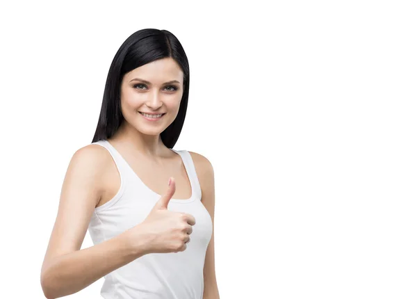 Linda morena sorrindo mulher com o polegar para cima gesto. Isolado sobre fundo branco . — Fotografia de Stock