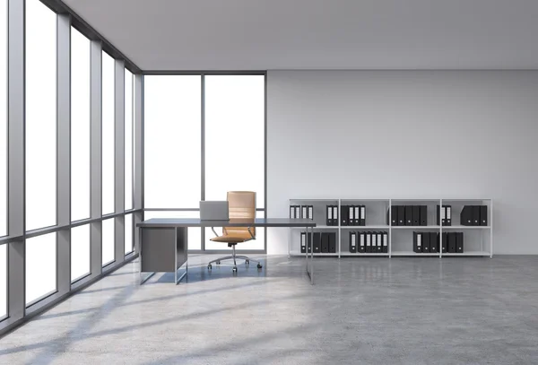 Ein Arbeitsplatz in einem modernen, panoramischen Eckbüro mit Kopierraum in den Fenstern. ein schwarzer Schreibtisch mit Laptop, brauner Ledersessel und ein Bücherregal mit schwarzen Aktenmappen. 3D-Darstellung. — Stockfoto
