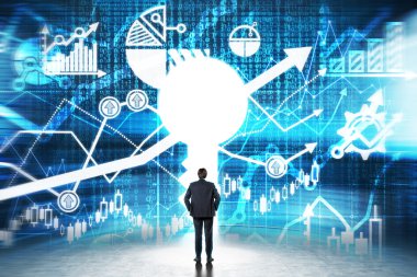 A keyhole in the wall with drawn financial charts. A businessman dressed in formal clothes is looking at the white hole.