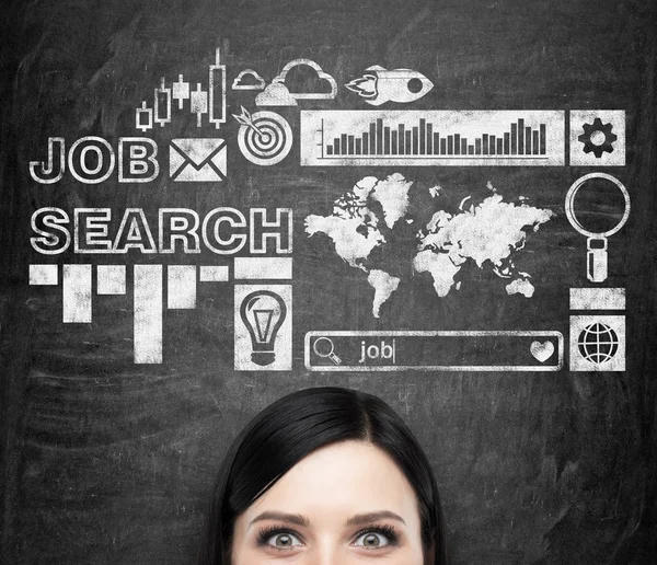 A forehead of the brunette girl who is pondering about a new job. Black chalk board with drawn icons about job search process on the background. — Stockfoto