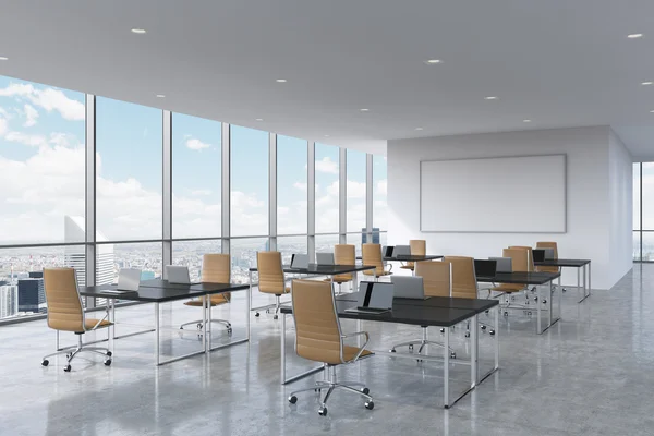 Corporate workplaces equipped by modern laptops in a modern panoramic office in New York City. Brown leather chairs and a black tables, a huge whiteboard on the wall. 3D rendering. — Stock Photo, Image