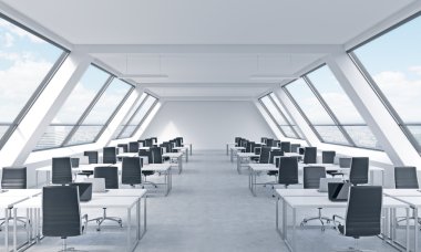 Workplaces in a bright modern open space loft office. White tables equipped by modern laptops and black chairs. New York panoramic view in the windows. 3D rendering.