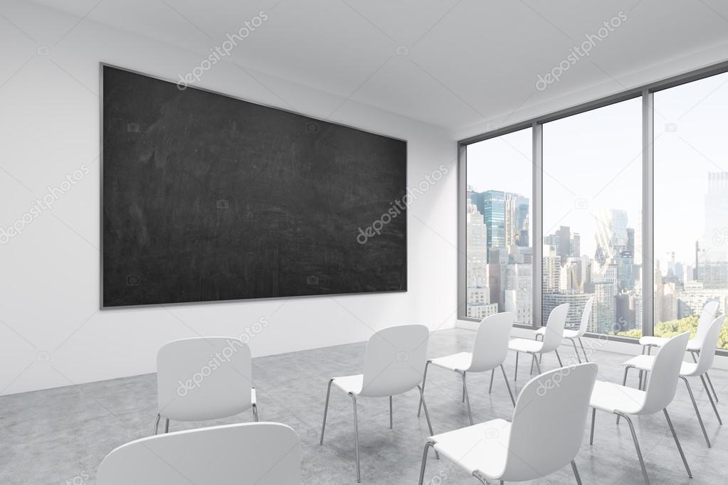 A classroom or presentation room in a modern university or fancy office. White chairs, a black chalkboard on the wall and panoramic New York view. 3D rendering.