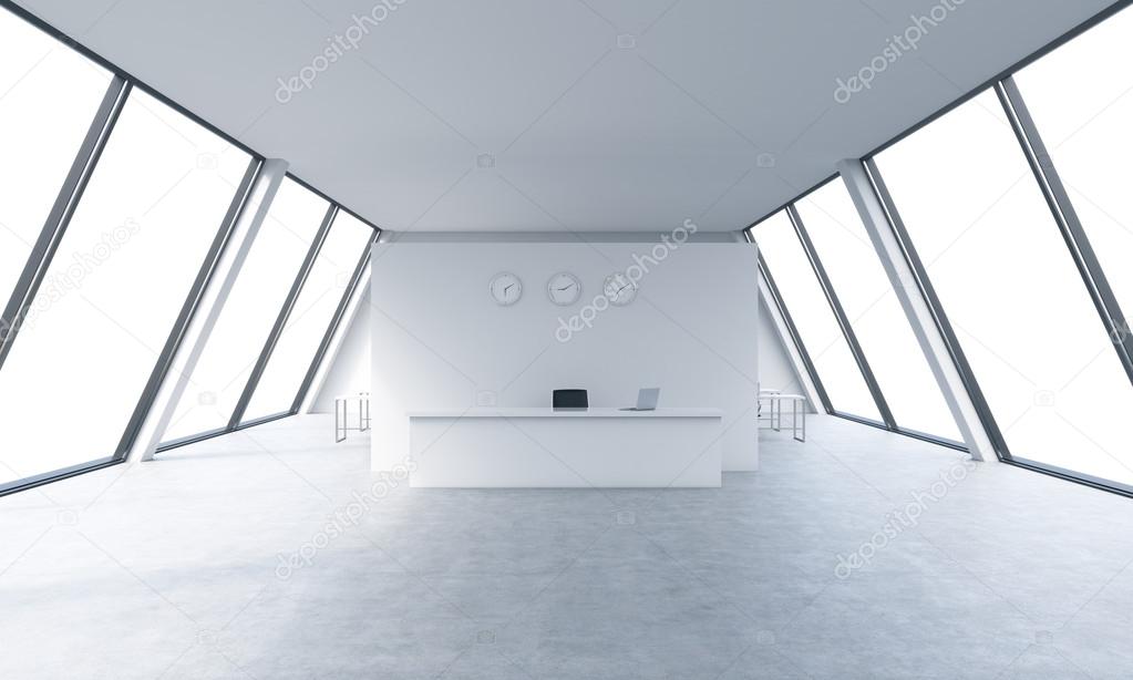 Reception area with clocks and workplaces in a bright modern open space