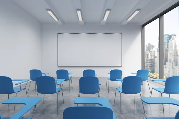 A classroom or presentation room in a modern university or fancy office. Blue chairs, a whiteboard on the wall and panoramic windows with New York view. 3D rendering. — Stockfoto