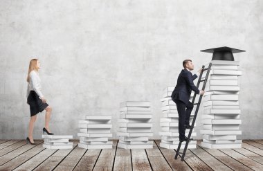 A woman is going up using a stairs which are made of white books to reach graduation hat while a man has found a shortcut to get education. Concrete wall and wooden floor.