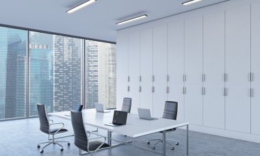 Workplaces or conference area in a bright modern open space office. White tables equipped by modern laptops. Singapore view. 3D rendering.