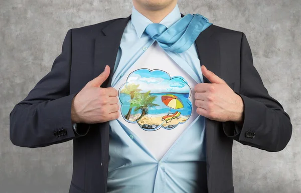 A close up of man's body who tears the shirt on the chest. A summer vacation sketch is on the chest under the shirt. Concrete background. — Stockfoto
