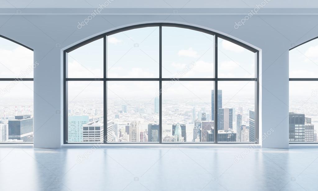 An empty modern bright and clean loft interior. Huge panoramic windows with New York city view. A concept of luxury open space for commercial or residential purposes. 3D rendering.