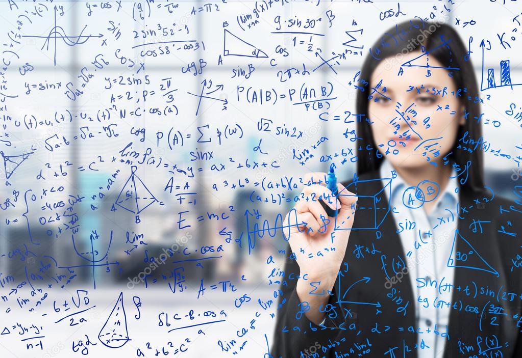 A brunette woman is writing down math formulas in the glass screen. Modern panoramic office with New York view in blur on the background.