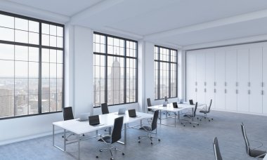 Workplaces in a bright modern open space loft office. White tables equipped with modern laptops and black chairs. New York panoramic view in the windows. 3D rendering.