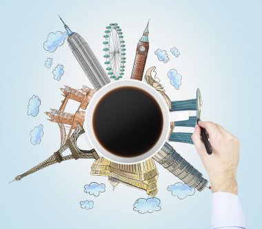 Top view of a coffee cup and the hand draws colourful sketches of the most famous cities in the world. The concept of travelling. London, Singapore, Pisa, Paris. Light blue background.