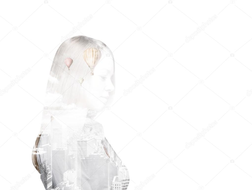 Side view of transparent silhouette of a business lady. New York city view inside the silhouette. White background.