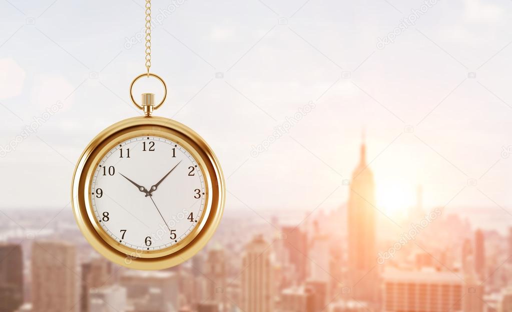 A model of pocket watch which is hanging on the chain. A concept of a value of time in business. A sunset panoramic New York view. 3D rendering. Toned image.