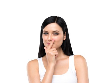 A portrait of a young artful brunette lady who is trying to develop her plan. The lady is in a white tank top. Isolated on white background. clipart