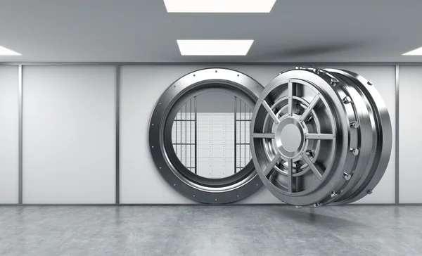 3D rendering of a big open round metal safe with lock-boxes behi — ストック写真