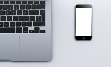 laptop and smartphone on office table, business and communicatio
