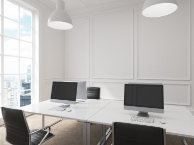 Four workplaces arranged in pairs symmetrically with computers only on them. Four leather chairs around the table. Window with city view to the left. Concept of information gathering.
