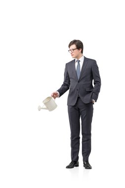 Businessman with a watering pot clipart