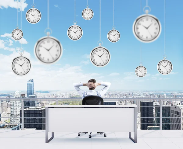 Businessman on the bench on the roof — Stok fotoğraf