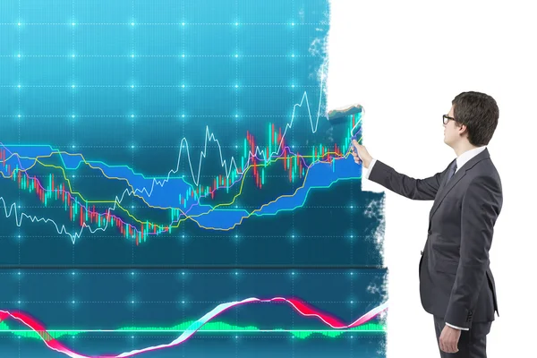 Businessman painting graphs — Stockfoto