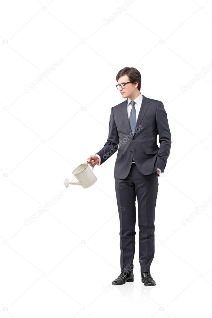 Businessman with a watering pot