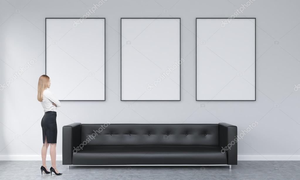 Three Frames Over A Sofa Stock Photo Denisismagilov