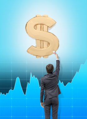 Businessman painting a dollar sign