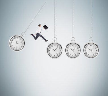 Businessman coping with timing