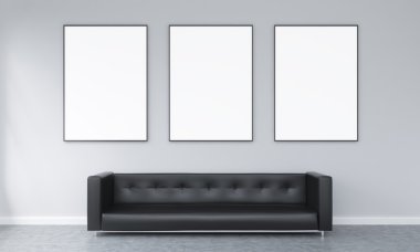 Three frames over a sofa