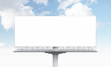 A huge blank billboard on one support, blue sky at the background.