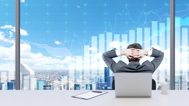 A businessman relaxing in his office