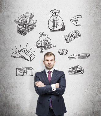 young man with arms crossed standing and looking in front, black pictures symbolizing money over his head.