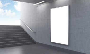 One vertical billboard in the underground, stairs up to the left, light seen.