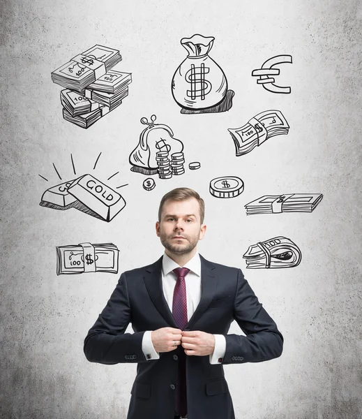 Young man with a raised thumb standing and looking in front, white pictures symbolizing money over his head. — Stock fotografie