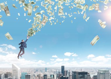 A young businessman flying over Paris with a magnet in hand that is pulled to money tornado.