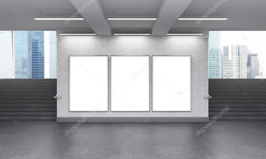 Three blank vertical billboard in the underground crossing, stairs up on both sides, Singapore seen from the street. Grey walls. Front view. Concept of underground advertising. 3D rendering