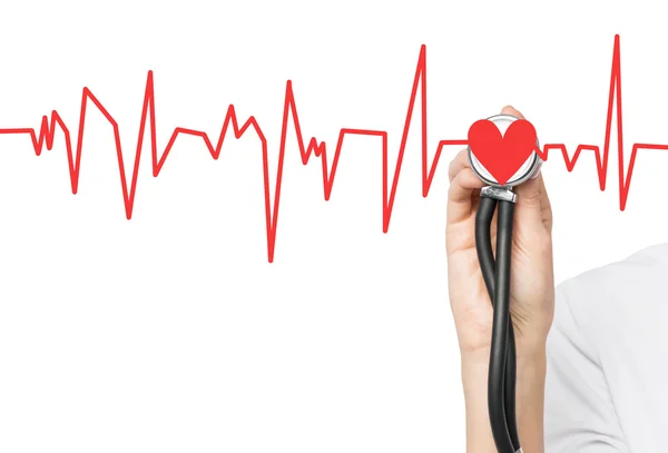 A hand listening to a red heart with a phonendoscope, the heart is a part of a cardiogram. — Stock Photo, Image