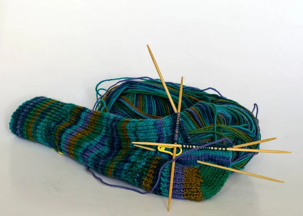 Knitted Sock Knitted Green Striped Yarn Wooden Knitting Needles Ball — Stock Photo, Image
