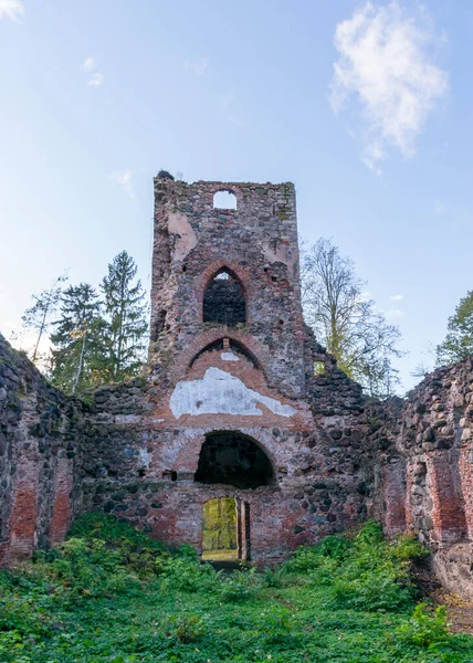 landscape with old church ruins, ruins overgrown with bushes and grass, autumn time, Ergeme Evangelical Lutheran Church was one of the most beautiful churches in Latvia, Latvia