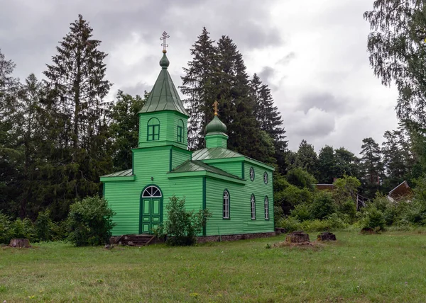 landscape of a wooden observation tower surrounded by pine trees in the forest, Rannametsa vaatetorn, Parnu county, Estonia
